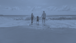 family travellers on beach