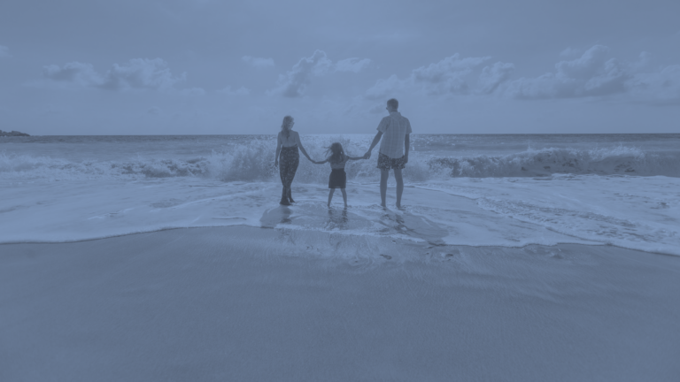 family travellers on beach